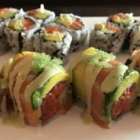 Queen Roll · Spicy crunch tuna, cucumber topped with salmon, avocado and tobiko. Served with wasabi sauce.