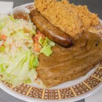 Plate #1 · 1 Pastele, Gandule rice, Bacalao salad, chorizo sausage or Pastele stew.