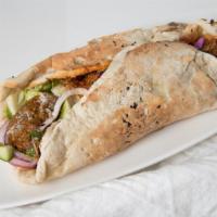 Wrap · Choose your naan  and top it off with your choice of green, grain, protein, spreads, dressin...