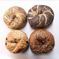 1/2 Dozen (6+1) Bagel Special · Buy half a dozen bagels get one free! Plain, everything, sesame, poppy seeds, cinnamon raisi...