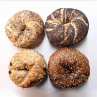 1 Dozen (12+2) Bagel Special · Buy one dozen bagels and get two free! Plain, everything, sesame, poppy seeds, cinnamon rais...