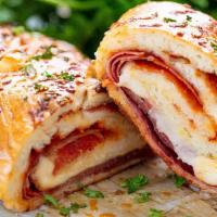 Stromboli · Includes ham, mushroom, pepperoni and mozzarella.