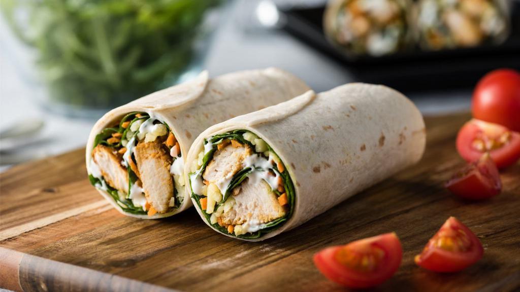 Chicken Caesar Wrap · Fresh Wrap made with Grilled chicken, parmesan cheese, croutons, and Caesar dressing.