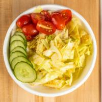 Ginger Salad · chopped iceberg / cucumber / grape tomato / himalayan salt / house-made ginger dressing
