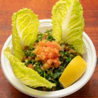 Tabouleh · Parsley, tomato, lemon, cracked wheat, and olive oil.