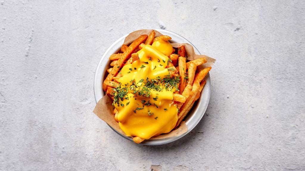 Cheese Fries · Crispy handcut fries with our homemade cheese sauce.