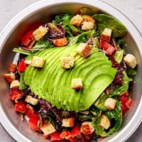 Avocado Caesar Salad · Spring mix salad with crunchy garlic croutons, avocado, tomatoes, and homemade caesar dressi...