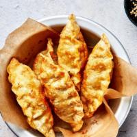 King Yaki Pork Gyoza · 5 pieces of our King size homemade seared then steamed pork dumplings