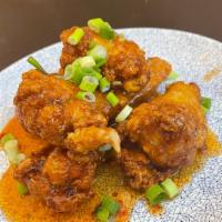 Buffalo Wings · Spicy. With chili tamarind glaze.