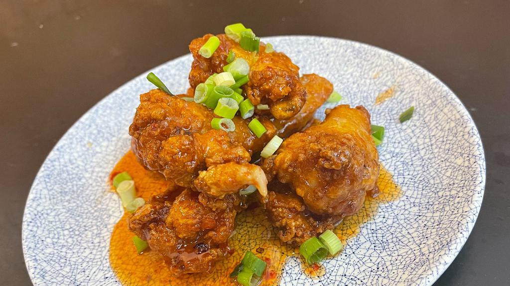 Buffalo Wings · Spicy. With chili tamarind glaze.