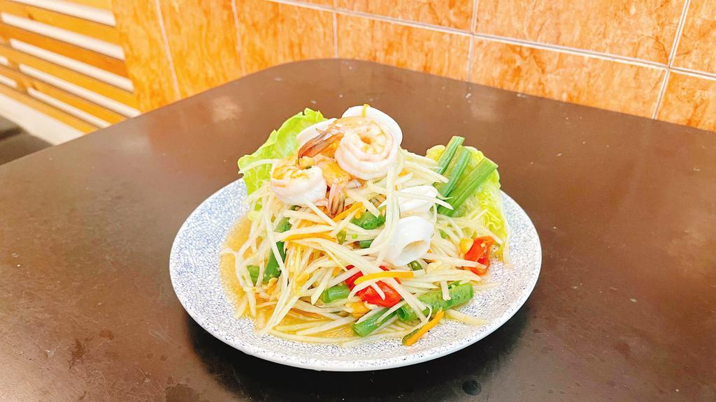 Som Tum Talay · Spicy. Papaya salad with shrimp and squid.