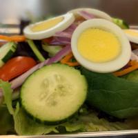 Thai Vegetable Salad · With egg lettuce, tomato, onion, carrot, cucumber and peanut dressing.