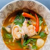 Tom Yum Soup · Spicy and sour soup, lemongrass and mushroom.
