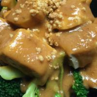Tofu Rama · Steamed broccoli and tofu served with peanut sauce.