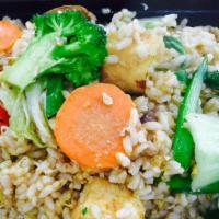 Delicious Fried Brown Rice · With vegetables, mushroom and tofu and egg.