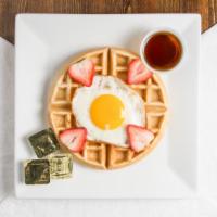 Waffle Plate · Waffle with fresh Strawberry and a fried egg.