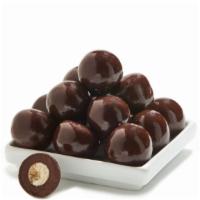 Truffle Bits · This chocolate covered truffle combination of rich dark chocolate makes a excellent party fl...