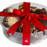 Chocolate Nut Clusters Assortment  · Allergy information: contains tree nuts, peanuts, wheat, eggs and soy.
