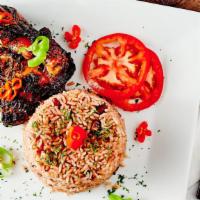 Jerk Chicken · Served with steamed vegetables and plantains. As well as your choice of White Rice -or- Rice...