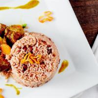 Curry Goat · Served with steamed vegetables and plantains. As well as your choice of White Rice -or- Rice...