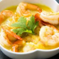 Coconut Curry Shrimp · Served with steamed vegetables and plantains. As well as your choice of White Rice -or- Rice...