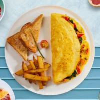 Veggie Omelette · Mushroom, onion, pepper, broccoli, tomato, and cheddar cheese served with home fries and toa...