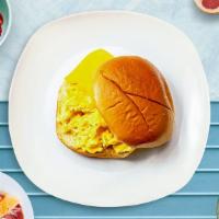 Egg And Cheese Sandwich · Scrambled egg, and cheddar cheese served on your choice of bread.
