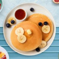 Banana Chip Pancakes · Fluffy banana chip pancakes cooked with care and love served with butter and maple syrup. Se...