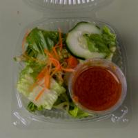 House Green Salad · Romaine and mesclun greens with ginger dressing.
