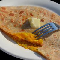 R5 Aloo Paratha · Wholesome wheat bread stuffed with boiled-mashed potatoes