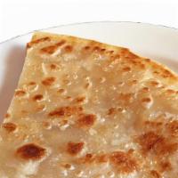 R4 Plain Paratha · Whole wheat Bread topped with melted butter