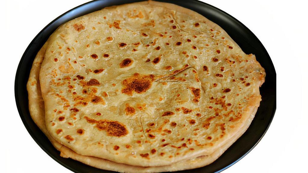 R7 Paneer Paratha · Whole wheat Bread stuffed with paneer mixture