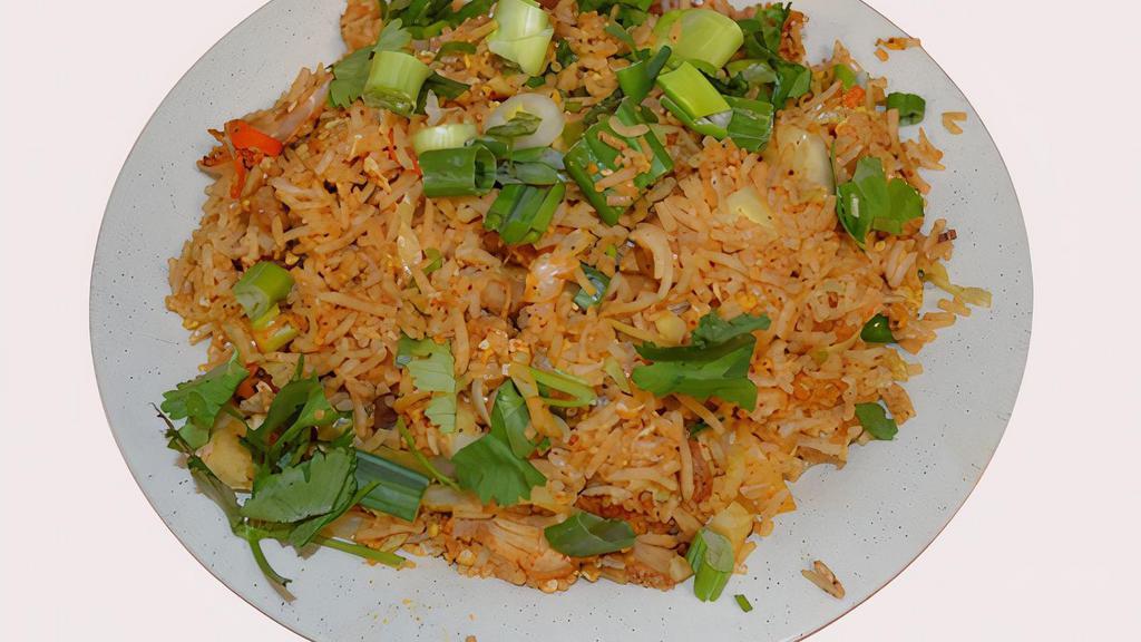 C12 Chicken Fried Rice · Stir fried rice with veggies, ginger, garlic, fried and chicken *Halal