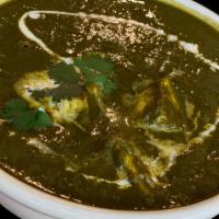 M9 Palak Paneer · Paneer cubes in Creamed spinach and fresh spices