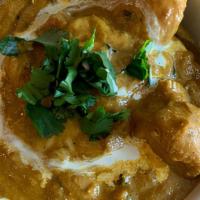 M28 Chicken Korma · Chicken Cooked with onion sauce and herbs. * Halal*