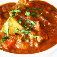 M21 Chicken Vindaloo · Chicken cubes cooked in a spicy sauce with potatoes and a touch of vinegar. *Halal*