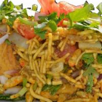 B2 Bhel Puri · Puffed rice, potatoes, chickpeas, crushed puris , onion blended with mint, garlic and tarmar...
