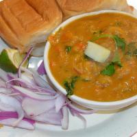 B13 Pav(2) Bhaji · Special mixed veggies mixed with spices. Served with special kind of bread (pav)