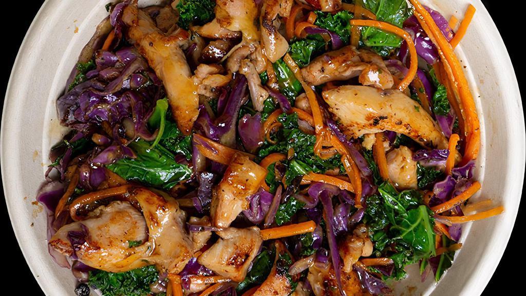 Teriyaki Super Food Bowl · Chicken teriyaki stir fried with kale, purple cabbage, and carrots on top of white rice.