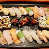 Sushi (For 2) · Tuna, yellowtail, salmon, white tuna, squid, scallop, shrimp, eel, red crab, eel cucumber ro...