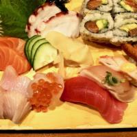 Sushi & Sashimi · Yellowtail, salmon, octopus, & fluke sashimi, white tuna, tuna, eel, & red crab sushi, salmo...