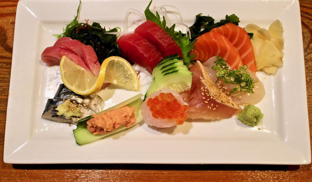 9 Pieces Sashimi · 9 pieces of tuna, yellowtail or salmon- same or assorted.
