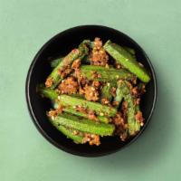 Classic Okra · Tender okra pods sauteed in a curry base made with piquant onions, tangy tomatoes, bold spic...