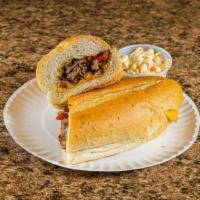 Philly Cheesesteak Hero · Grilled roast beef, sauteed onions and American cheese.