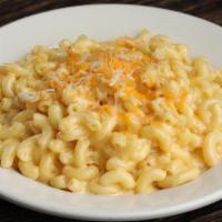 Classic Mac · Traditional mac & cheese, topped with shredded cheese