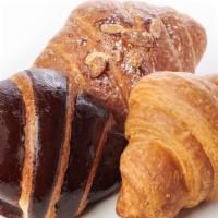 Cornetto Alla Mandorla (Almond) · Italian Croissant stuffed with almond paste and topped with toasted almonds