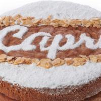 Torta  Caprese Al Limone · Classic Neapolitan soft flourless cake baked with almond flour, pure white chocolate and Lim...