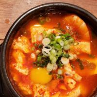 Soondubu Jjigae / 순두부 · Spicy. Soft Tofu Stew (a choice of beef or seafood).