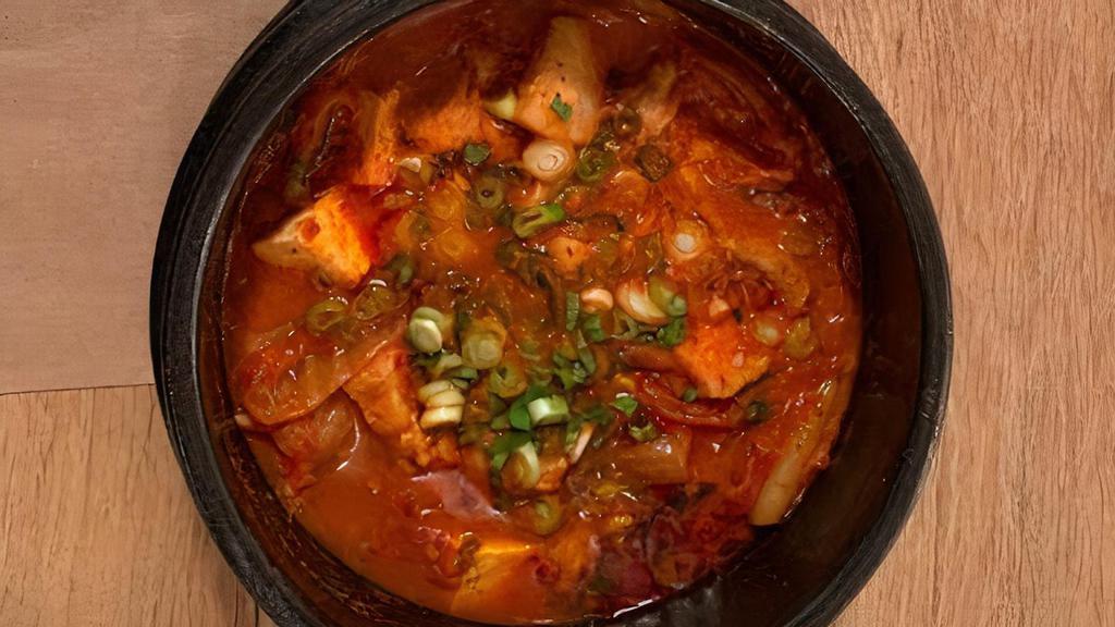 Kimchi Jjigae / 김치찌개 · Spicy. Kimchi stew with pork.
