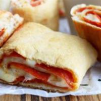 Pepperoni Roll · Add extra toppings for an additional charge. Pepperoni pizza in a roll.